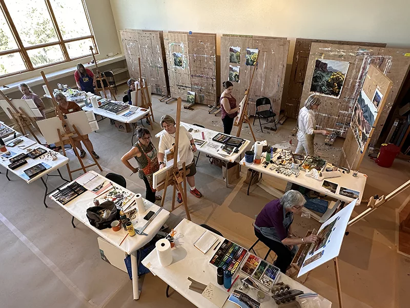 Overhead shot of Jenny Lang and the other students at Isenhour's workshop.
