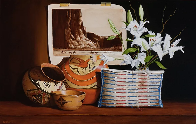 still life of pots, plants and a bag with a picture of horses in front of a mesa in the background.